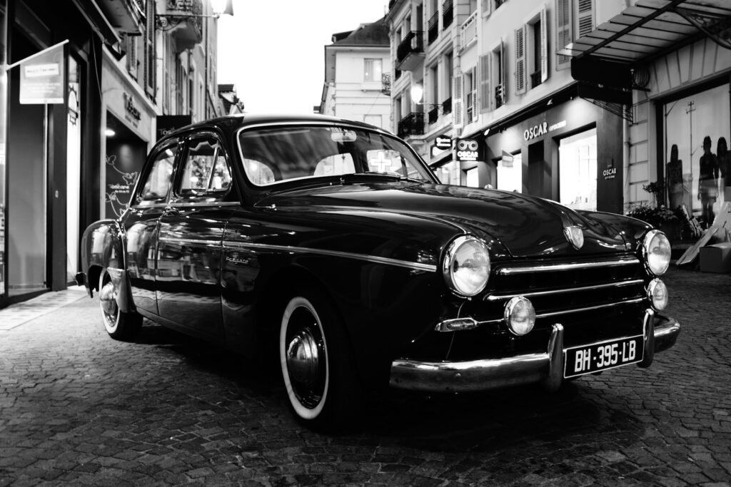 Black and white photo of a classic Renault car