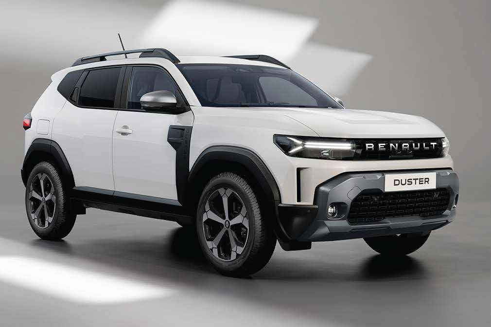 Front three-quarter view of a white Renault Duster SUV on a light gray background, showing its rugged styling and grille details.