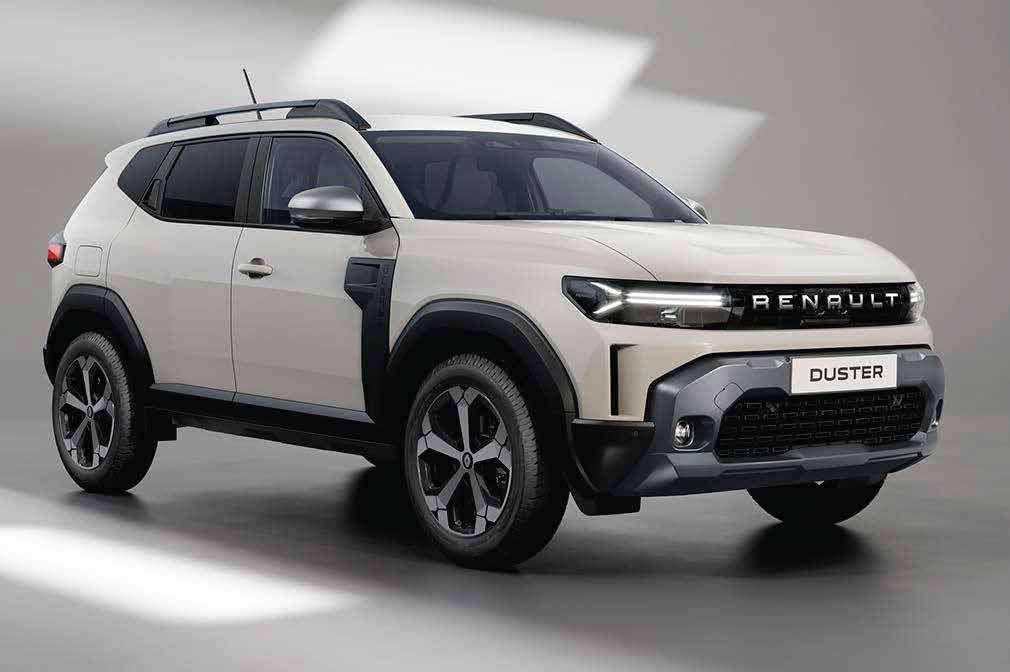 White Renault Duster SUV shown from a three-quarter front angle in a studio setting.
