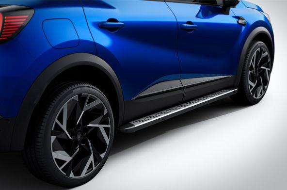 Blue SUV shown from the side, highlighting the running boards and stylish black alloy wheels.